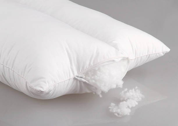 white pillow display cotton wool inside hygiene white pillow display cotton wool inside wool photos stock pictures, royalty-free photos & images