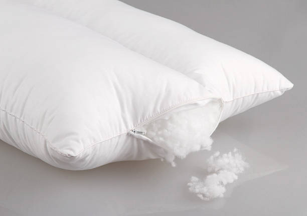 white pillow display cotton wool inside hygiene white pillow display cotton wool inside Stuffing stock pictures, royalty-free photos & images