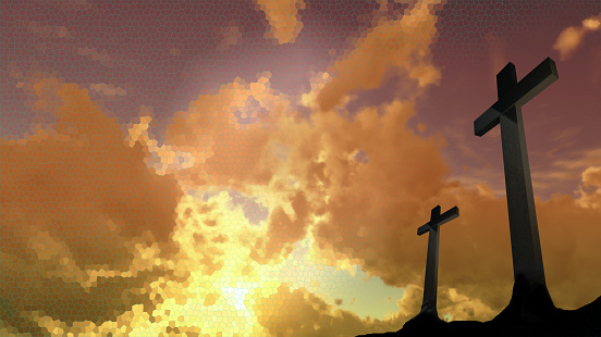 Religious cross on the hill at sunset.