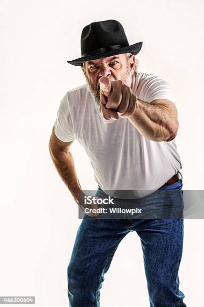 Snarling Senior Man Pointing And Threatening Stock Photo - Download Image Now - 2015, Active Seniors, Adult