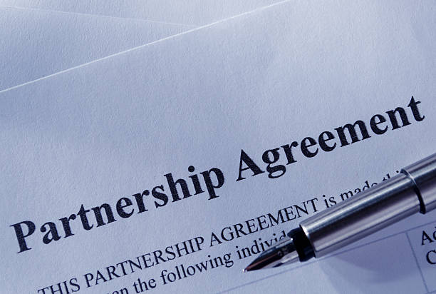 istock Macro Partnership Contract Paper and Pen 466303154