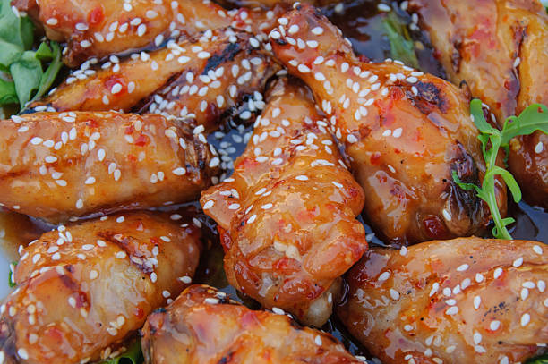 istock Chiken wings with hot sauce 466303510