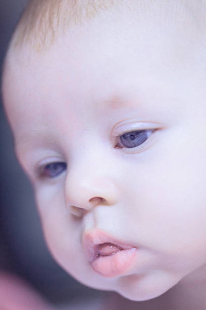 istock Cute baby girl looking sleepy 466303550