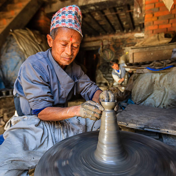 istock Nepali potter working on the pottery square in Bhaktapur 466303818