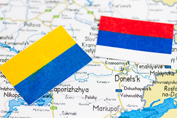 Ukraine map and its political crisis Ukraine map and donets is marking with Ukraine and Russia flags crimea photos stock pictures, royalty-free photos & images