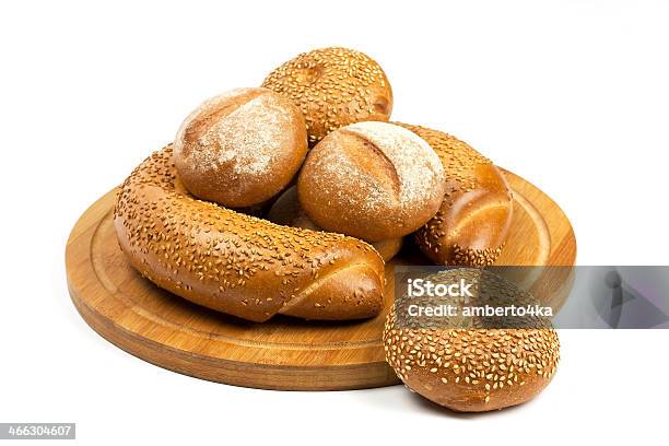 Assortment Of Baked Bread On Wood Table Stock Photo - Download Image Now - Bagel, Baked, Baked Pastry Item