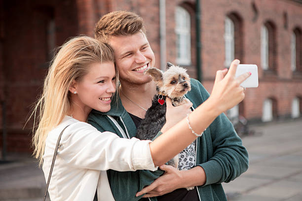 istock Young couple walking with their dog. 466304806