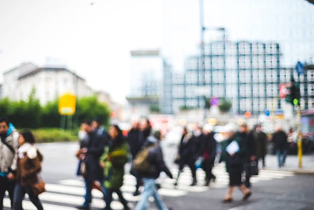 istock blurred city and people 466304879