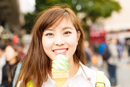 smiling asian beautiful woman traveling portrait,modern lifestyle and tourism concept