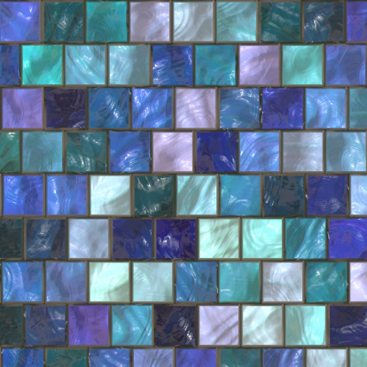 Marrakech green blue glazed tiles mosaic herringbone pattern on floor of Moroccan Riad
