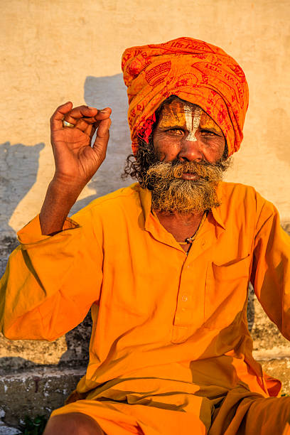 istock Sadhu - indian holyman sitting in the temple 466309476