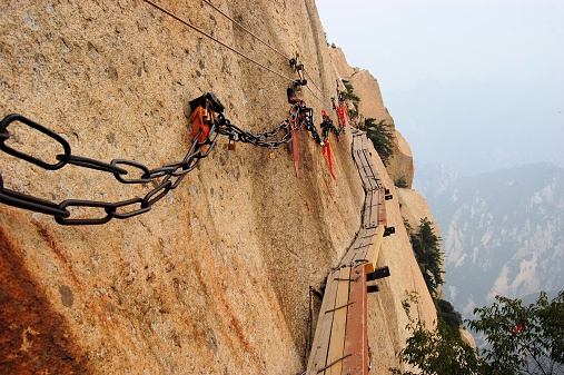 Dangerous walkway via ferrataat top of holy Mount Hua Shan in Shaanxi province near Xi'an, China