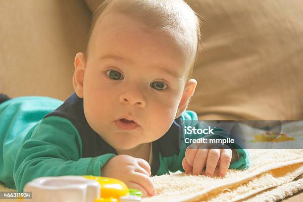 Cute Baby Boy Lying On Tummy Stock Photo - Download Image Now - 2-5 Months, 2015, Abdomen