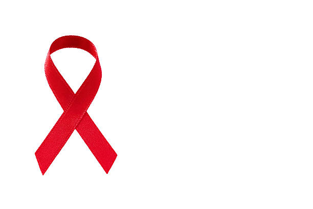 istock Red ribbon crossed to symbolize AIDS support 466315278