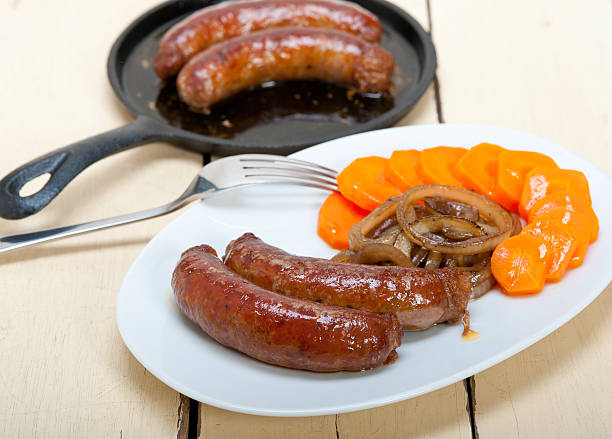 istock beef sausages cooked on iron skillet 466316926