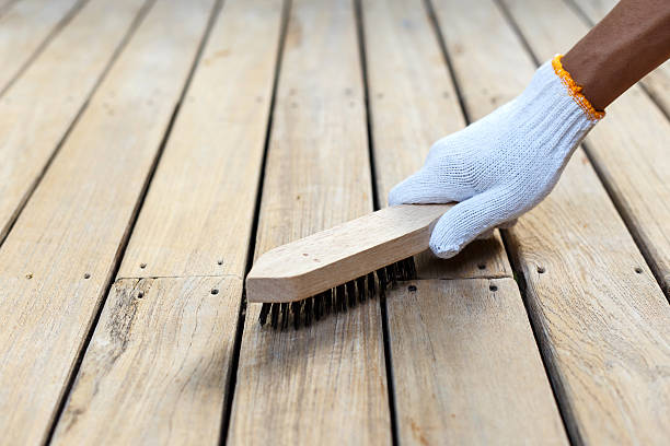 istock Hand holding steel brush 466318518