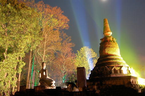 Lightshow at temple Wat Phra Kaeo in Kamphaeng Phet Historical park, Thailand