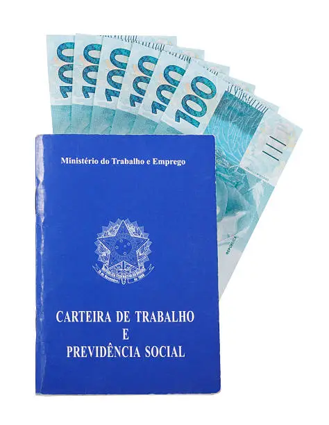 Photo of brazilian document for work and social security over money