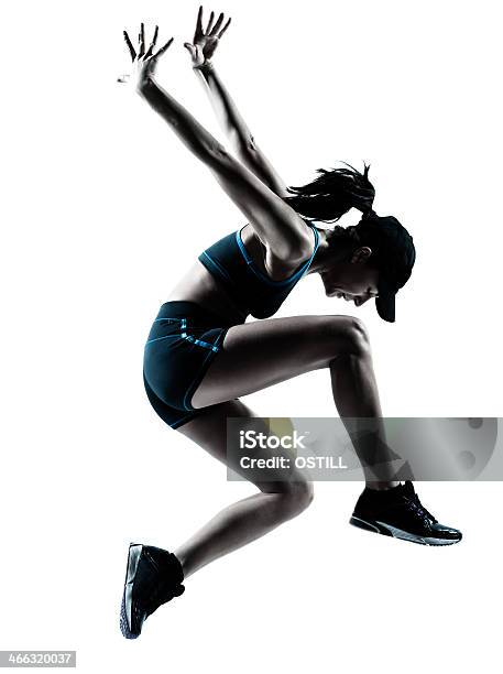 Woman Runner Jogger Jumping Silhouette Stock Photo - Download Image Now - Exercising, Jumping, Side View