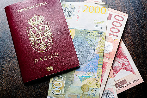 istock Serbian passport and currency 466321112