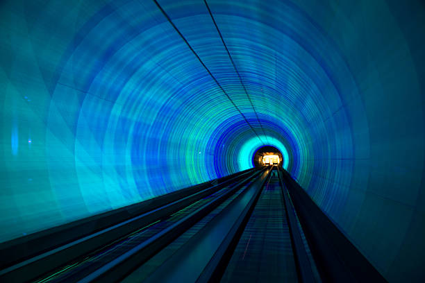 istock futuristic super speed traffic  blur motion in tunnel 466321272
