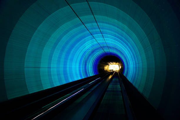 istock futuristic super speed traffic  blur motion in tunnel 466321366