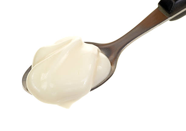 istock Spoon full of vanilla yogurt 466321688