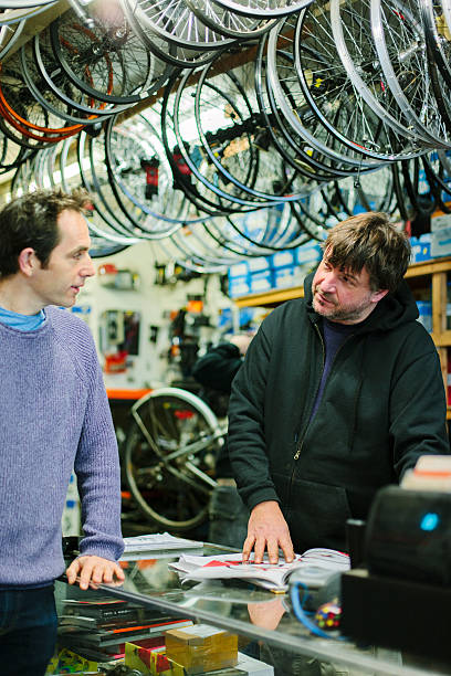 istock Serving a customer, bicycle shop, smiling and talking 466321738