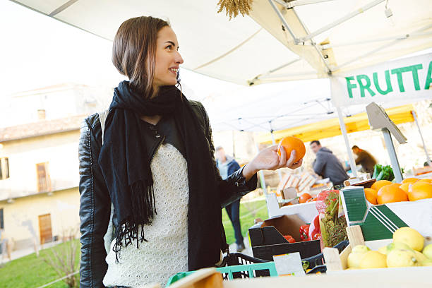istock Young Woman At The Market 466323176