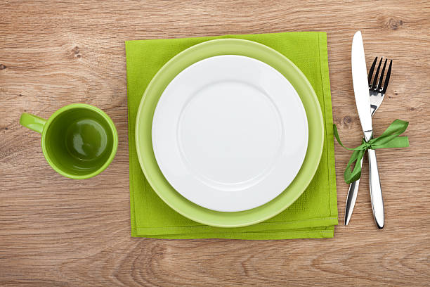istock Fork with knife, blank plates and napkin 466324235