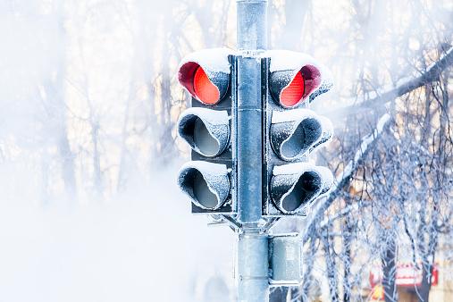 Frozen traffic lights in the winter city