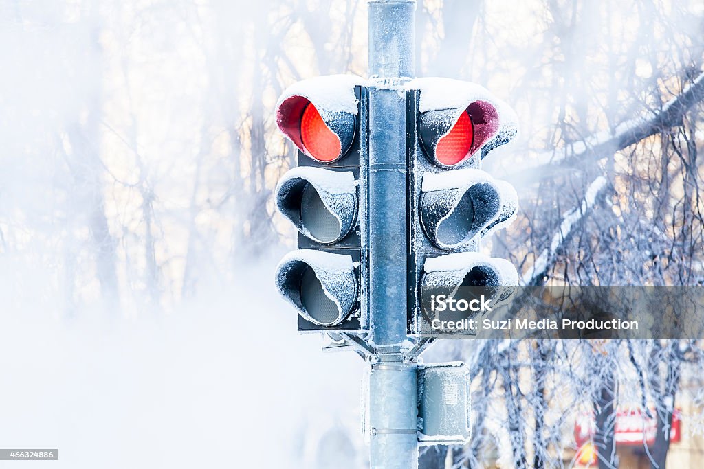 Frozen traffic lights Frozen traffic lights in the winter city Snow Stock Photo