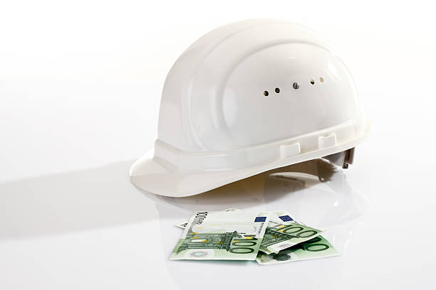 istock Hardhat and 100 Euro bank notes 466325174