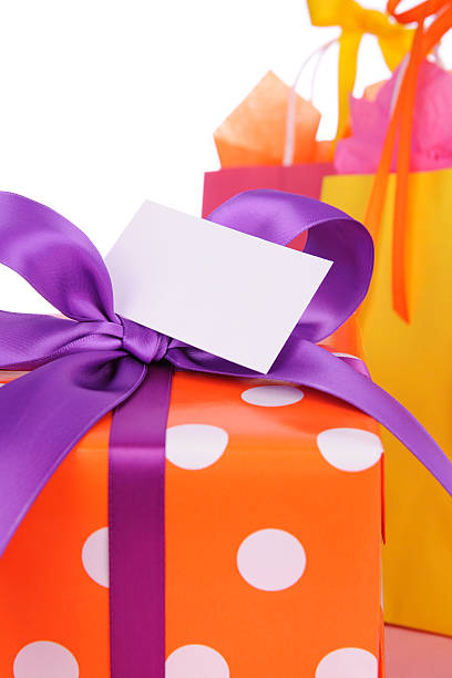 Colorful fun gifts with a blank card for your special text on a white background.