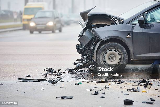 Car Crash In Urban Street With Black Car Stock Photo - Download Image Now - Car Accident, Crash, Misfortune