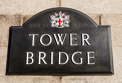 London, UK - March 2, 2015: The road sign for Tower Bridge in London on 2nd March 2015.