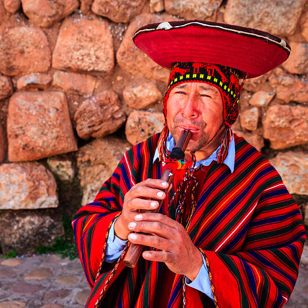 istock Portrait of Peruvian man playing a flute, Sacred Valley 466329742
