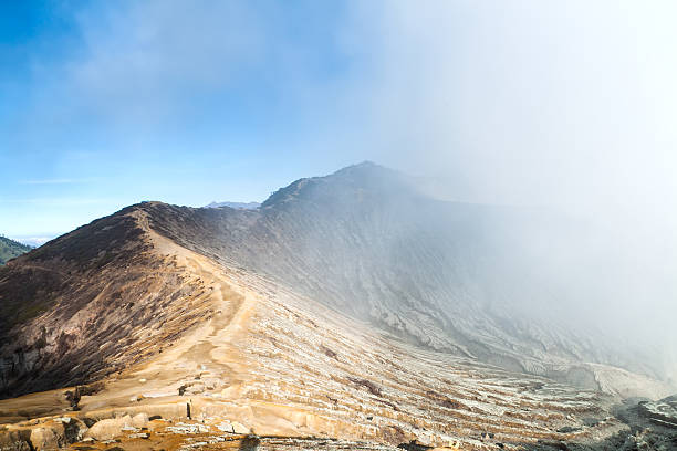 istock Crater of volcano Ijen in misty, Java, Indonesia 466329952