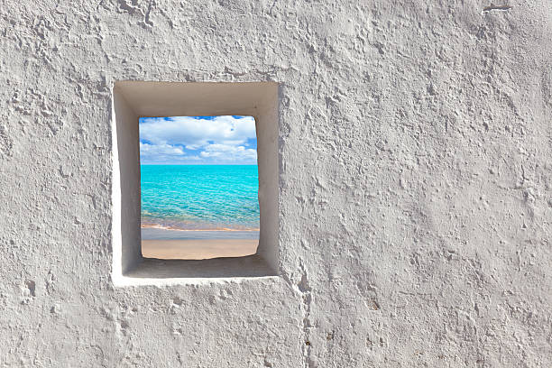 istock Balearic islands idyllic turquoise beach from house window 466331822
