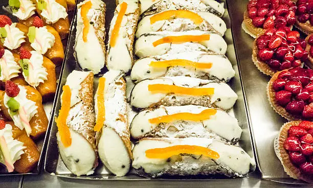 Cannolo pastry, display for sale, Sicily, Italy.