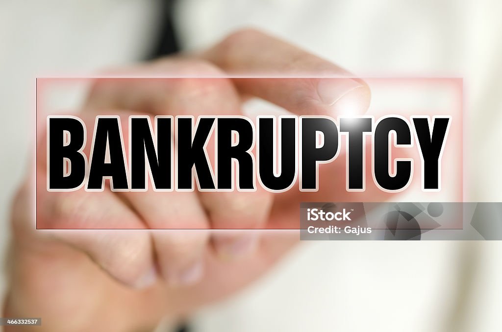 Bankruptcy Bankruptcy button on virtual screen. Animal Body Part Stock Photo