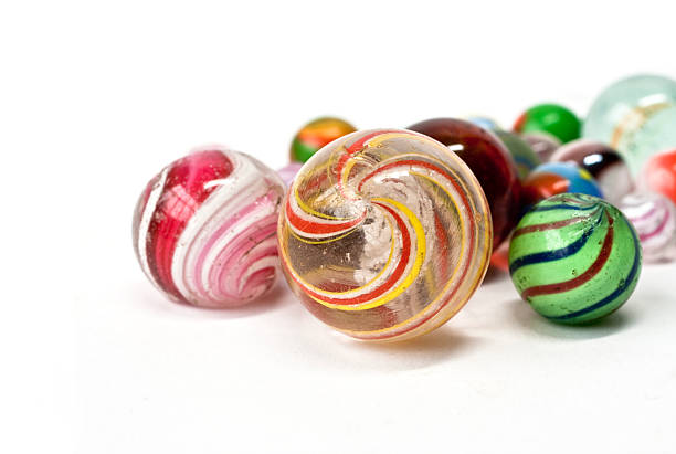 istock Vintage colorful glass marbles on white background. 466334049