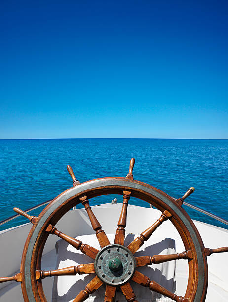 Boat helm on the sea Boat helm on the sea rudder stock pictures, royalty-free photos & images