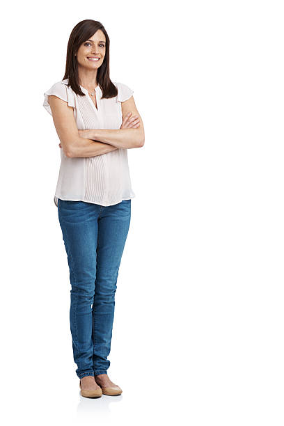 Ready for anything Full length studio portrait of an attractive mature woman standing with her arms crossedhttp://195.154.178.81/DATA/istock_collage/a3/shoots/785161.jpg jeans photos stock pictures, royalty-free photos & images