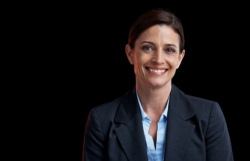 Studio portrait of a confident mature businesswoman isolated on blackhttp://195.154.178.81/DATA/istock_collage/a3/shoots/785178.jpg