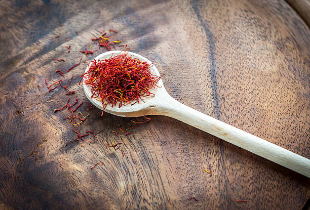 istock Saffron on the wooden spoon 466335602