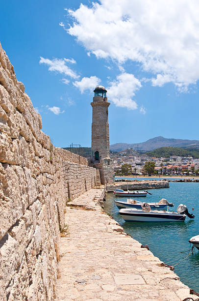 The medieval wall the lighthouse. Rethymno,Crete in Greece. stock photo