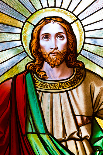 A close-up of a stained glass window depicting Jesus Christ, old church window from 1854, artist unknown, Czech Republic, full frame