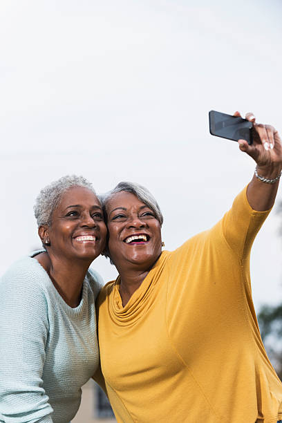 istock Two senior black women taking a selfie 466337092