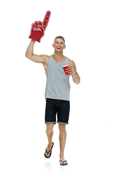 istock Cheerful male holding cup and walking 466337320